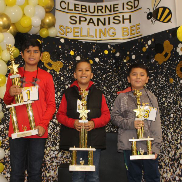  Three students with trophies