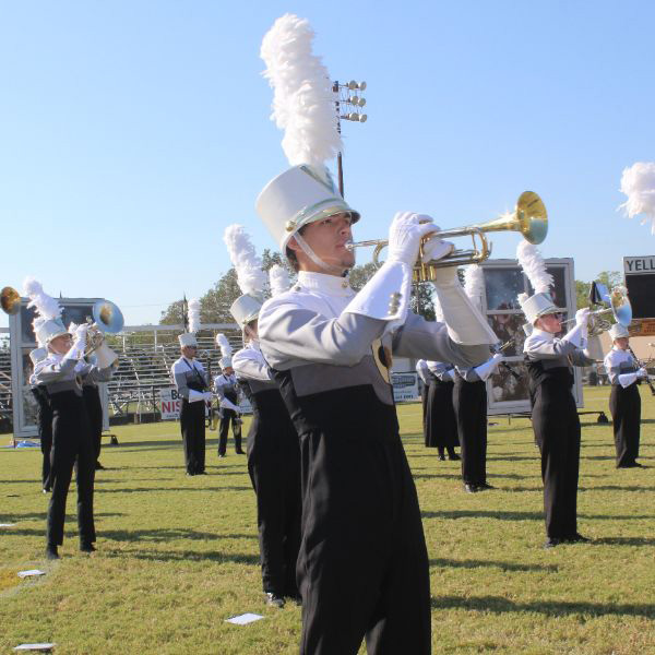  photo of band students playing on field